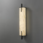 Large angled view of this Clérachic alabaster wall light on a plain grey wall, with veined stone panels and a slim black frame.