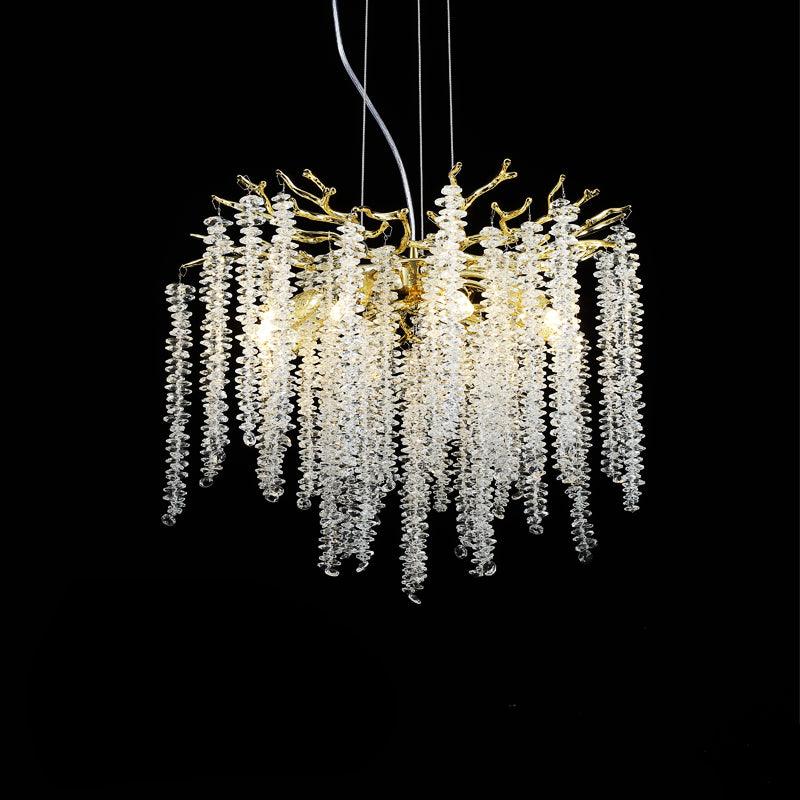 The Clérachic Albero chandelier on black, seen close so the beaded crystal strands read clearly.