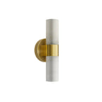 Clérachic Alight wall lamp shown small in frame, brass collar and backplate centred on the slim alabaster cylinder.