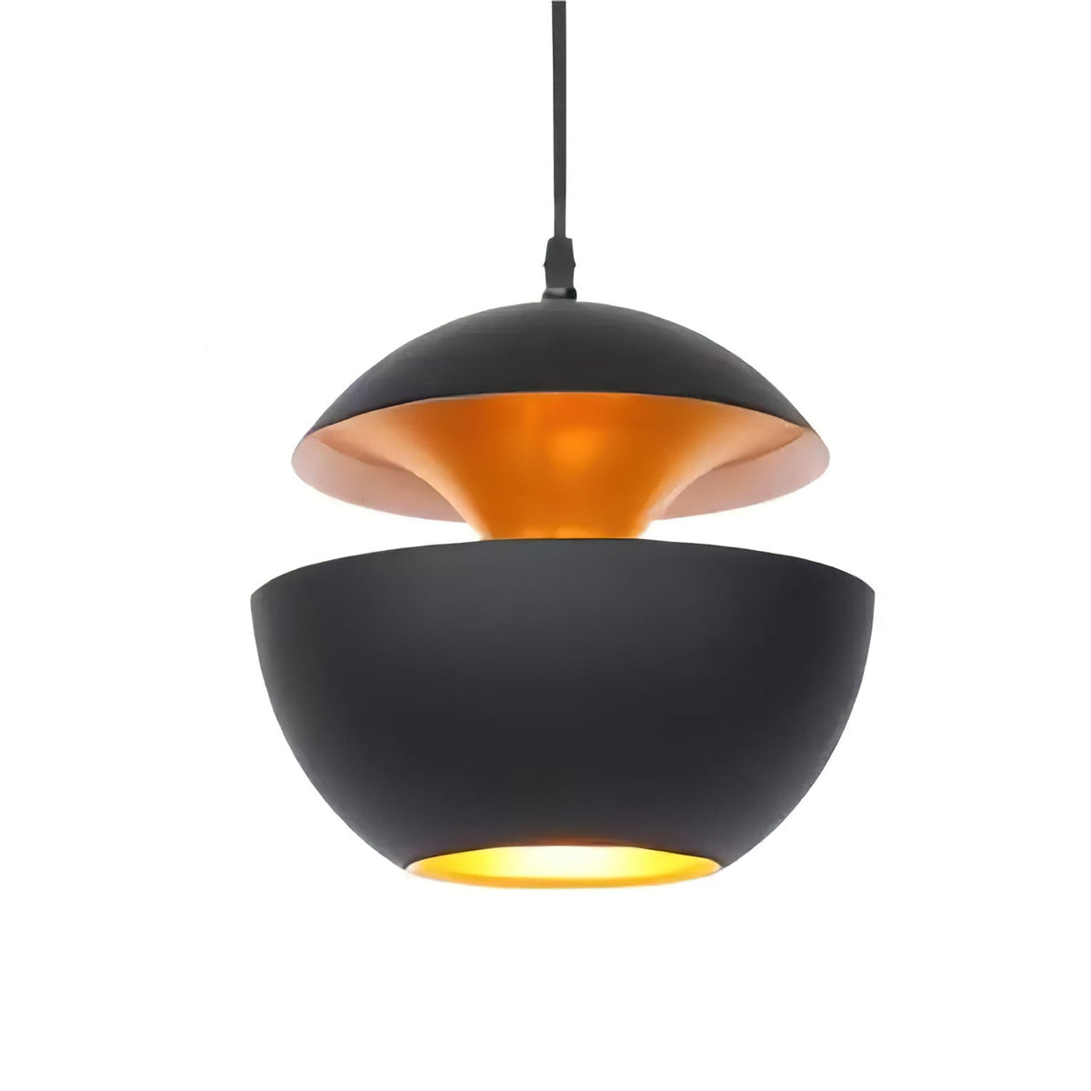 Black Clérachic pendant with a gold interior and a glowing opening at the base, on a plain white backdrop.