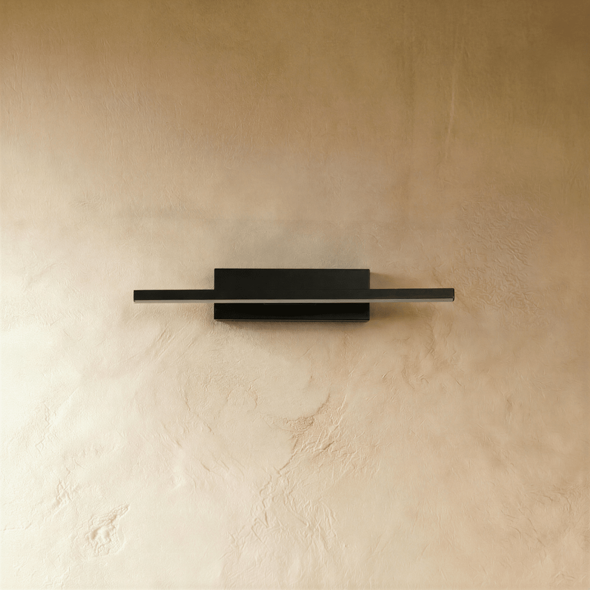 Clérachic black bar wall light switched off, showing its slim matte black aluminium arm and rectangular wall plate.