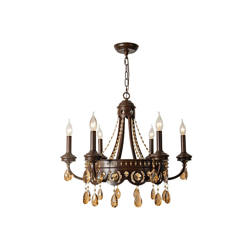A Clérachic chandelier with six candle lights, amber crystal drops and a bronze-finish frame, on a white background.