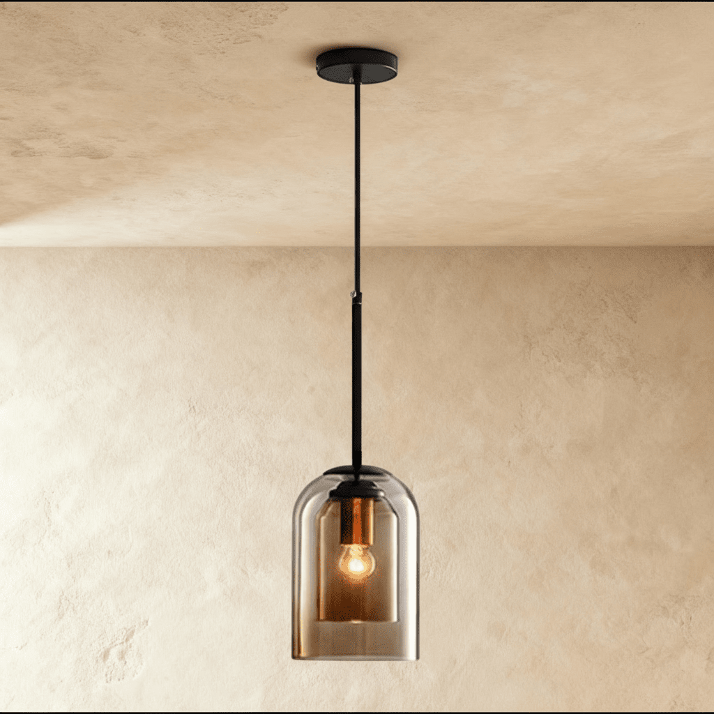 A front view shows the Clérachic smoky gray glass pendant lit softly, its bulb visible through tinted glass.