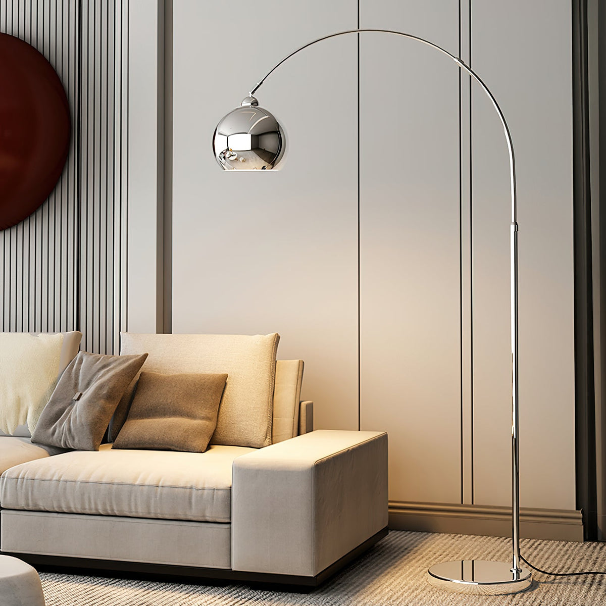 A Clérachic chrome arc lamp stands behind a beige sofa with tan cushions, in front of fluted wall panels and a rust circle.