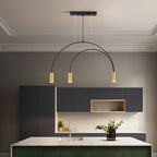 Over a green marble island, this Clérachic arch pendant has three brass spot heads and a short black canopy.