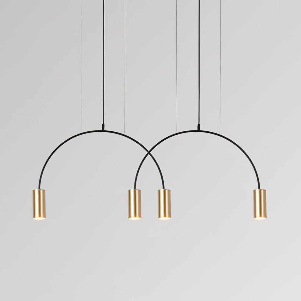 Two black arches and four brass spot heads, this Clérachic pendant hangs on a pale grey backdrop.