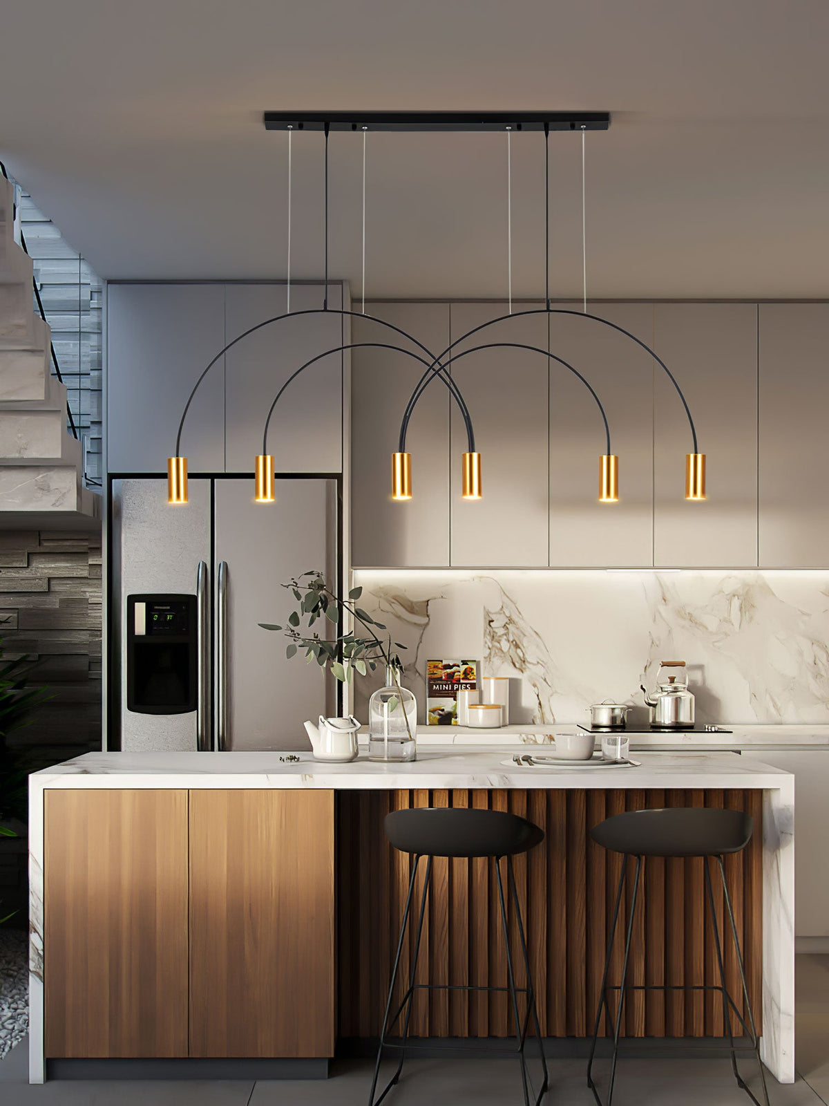 A black canopy bar tops this Clérachic arch pendant, whose six brass spot heads glow above a kitchen island.