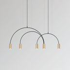 Five brass spot heads, with three arches stepping down in size, on this Clérachic pendant.