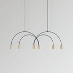 Six brass spot heads hang in an even row beneath the crossing black arches of this Clérachic pendant.