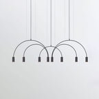 Eight black spot heads under overlapping black arches, this Clérachic pendant on a soft grey backdrop.