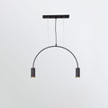 A single black arch with two spot heads hangs from a flat black canopy bar on this Clérachic pendant.