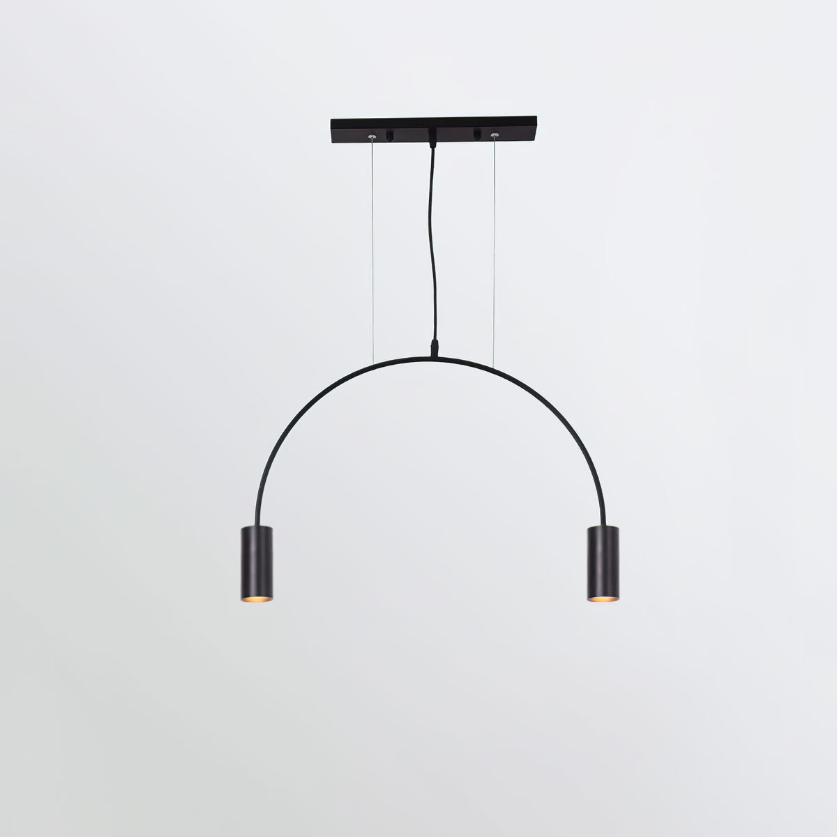 A single black arch with two spot heads hangs from a flat black canopy bar on this Clérachic pendant.