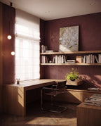 Clérachic slim black arch pendant with two lit globes beside a window in a study with shelves and a wooden desk.