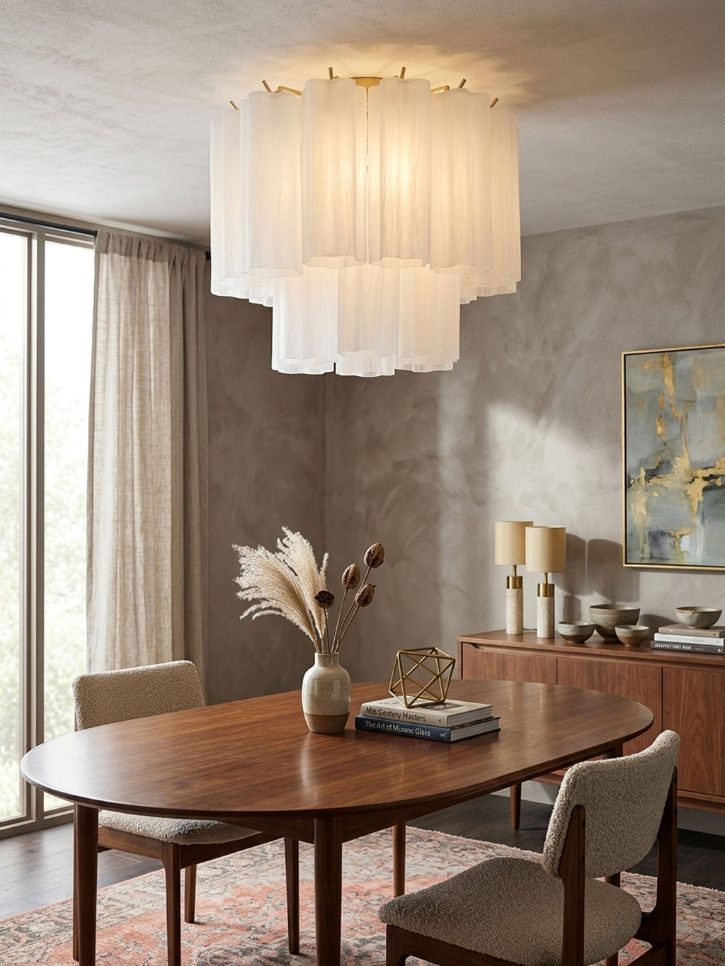 White frosted Clérachic flush mount above an oval walnut dining table, with grey upholstered chairs and a tall window with a linen curtain.