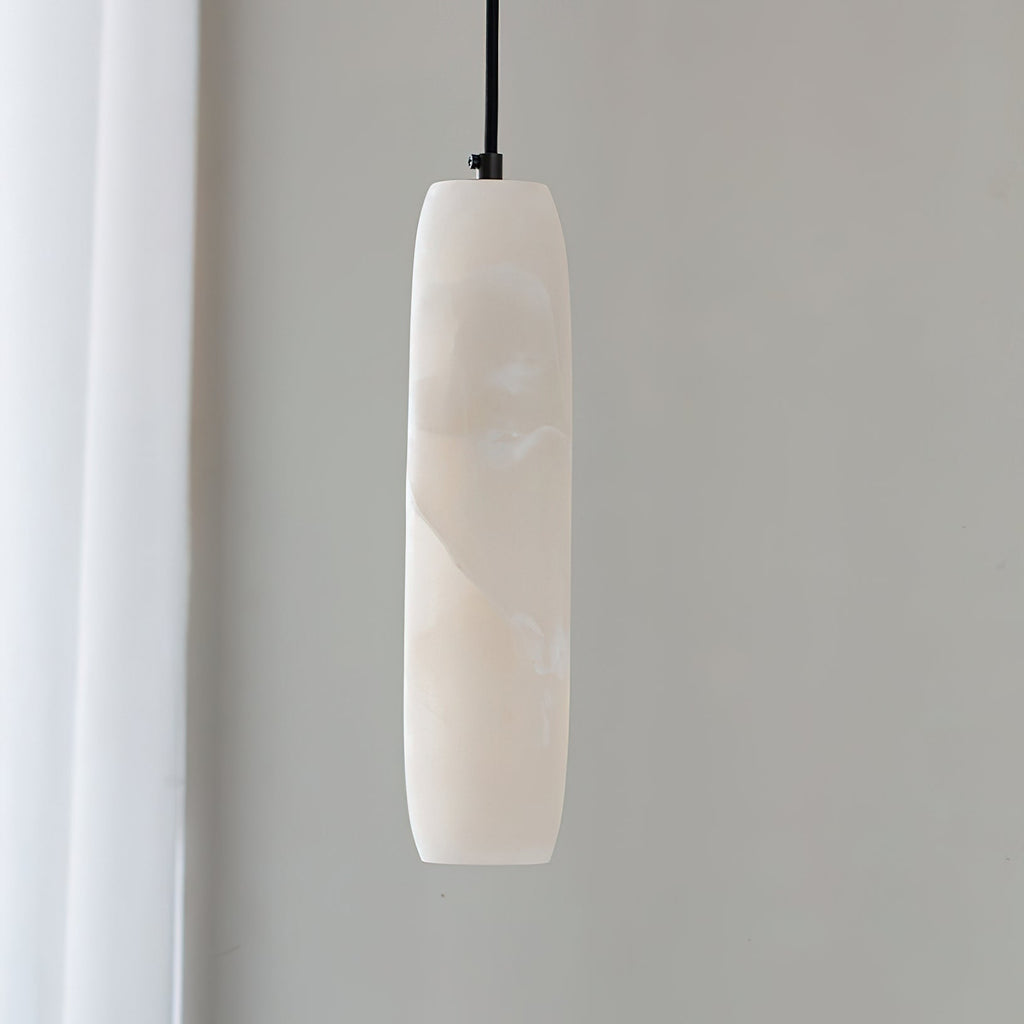 The Clérachic Asbury unlit and close up, showing the cool white alabaster grain and the black fitting at its crown.