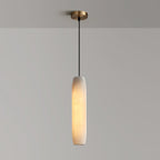 Clérachic shows the full Asbury drop on plain grey: brushed brass ceiling canopy, black cable, lit alabaster shade.