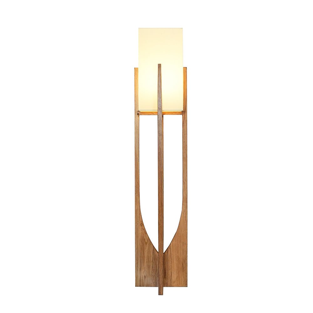 Dark-wood version of this Clérachic floor lamp on a white backdrop, its fabric shade lit and its curved cut-out in view.