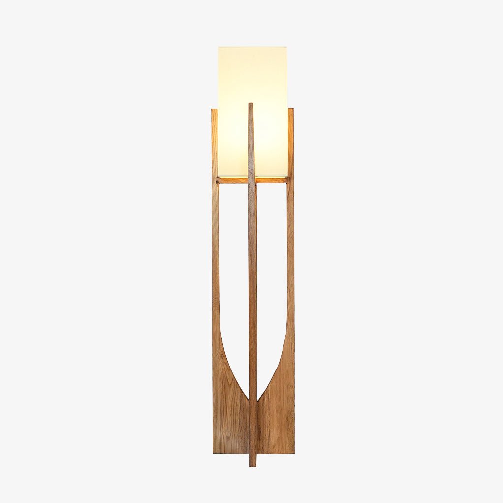 Floor lamp from Clérachic on a white backdrop, its shade lit warm and its frame in a mid-toned natural wood.