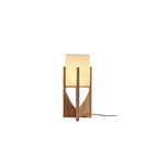 Small version of this Clérachic lamp in dark wood, with a cream shade and a black cord, on a white backdrop.