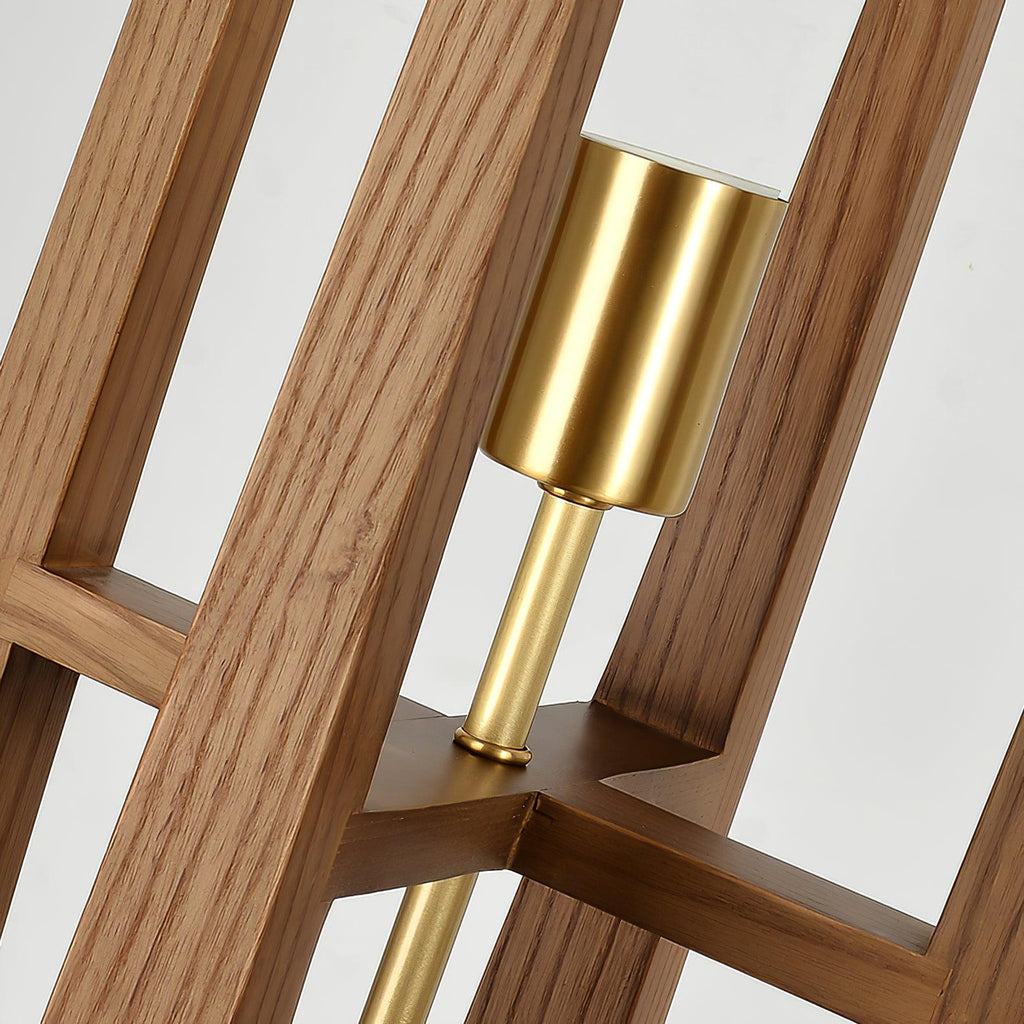 Close view of the wooden frame joints, the brass bulb holder and the brass rod inside this Clérachic floor lamp.