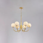 Clérachic Aurelian chandelier, six alabaster globes on curved brass arms below a brass chain.