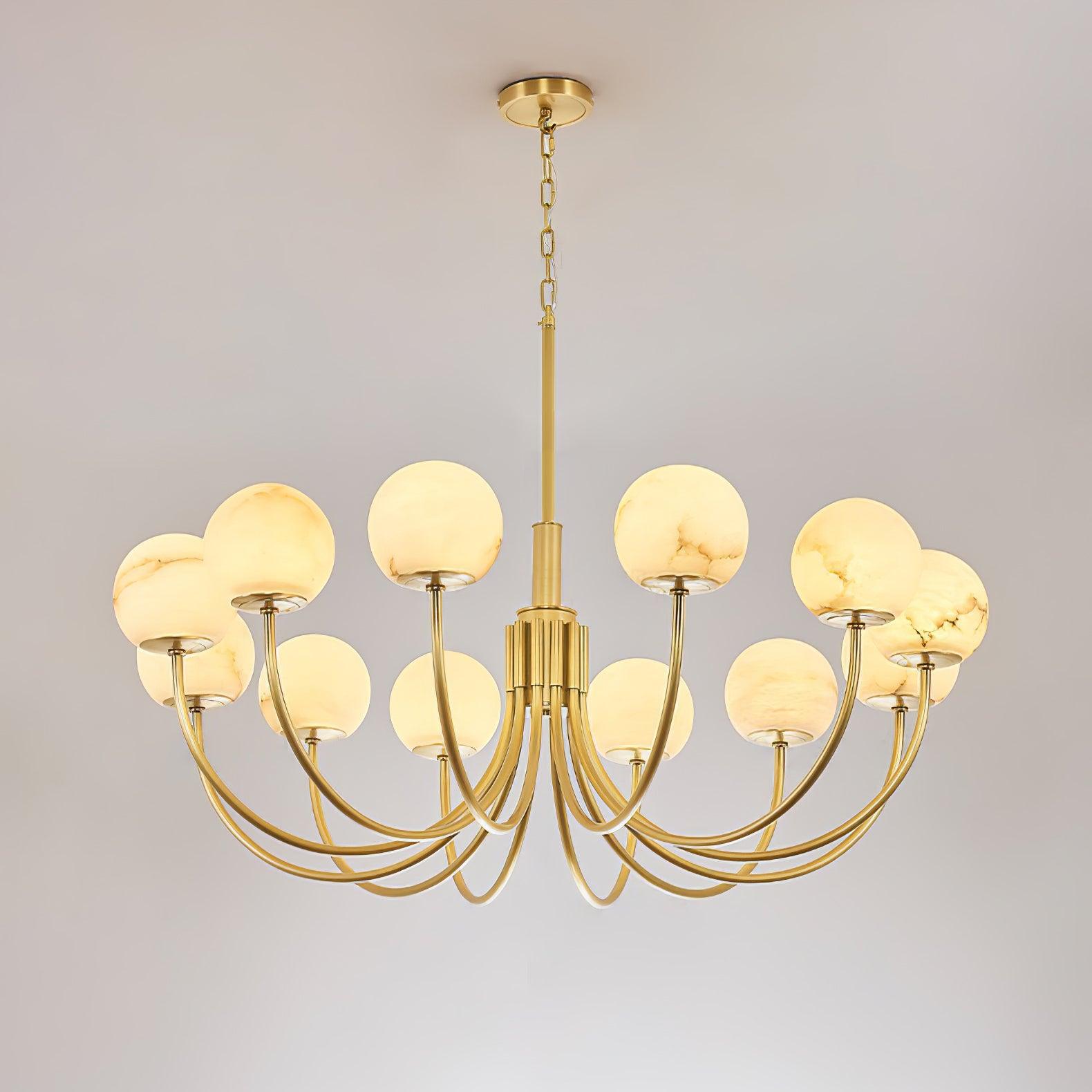 The Clérachic Aurelian chandelier on grey, seen level so the globes read as a single ring.