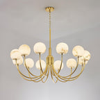 Clérachic Aurelian chandelier viewed from below, brass arms radiating from the fluted column.