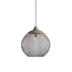 The Clérachic mesh pendant hangs from a rust cord against a plain white background.