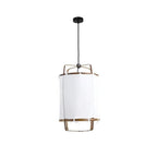 Bamboo pendant light with linen fabric shade glowing warmly