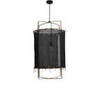The black open-weave shade version of the pendant, its dark gauze panel stretched inside the honey bamboo frame.