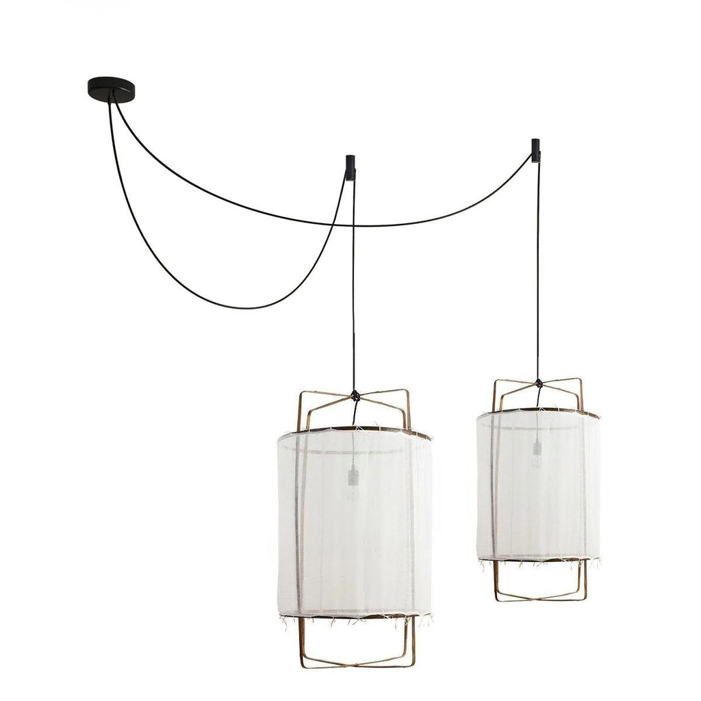 The same twin-swag pair in a sheer white gauze shade, with the bare bulbs showing through