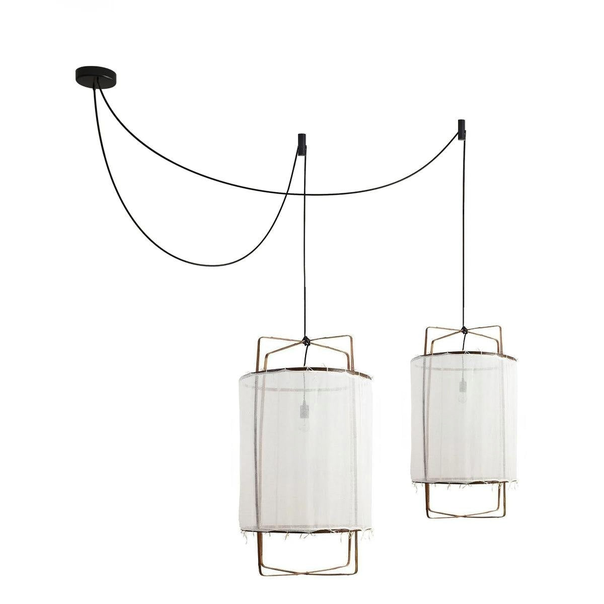 The same twin-swag pair in a sheer white gauze shade, with the bare bulbs showing through