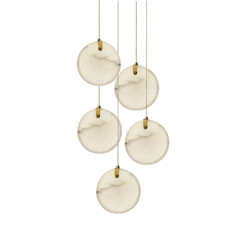 The five-head Clérachic alabaster pendant, its discs falling at staggered heights on clear braided cables.
