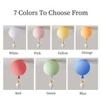 Colour chart of this Clérachic balloon light in seven shades, from white and pink to red, green and blue.