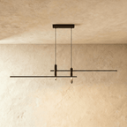 Clérachic black bar pendant light with twin cylindrical LED drops, unlit against a plaster ceiling.