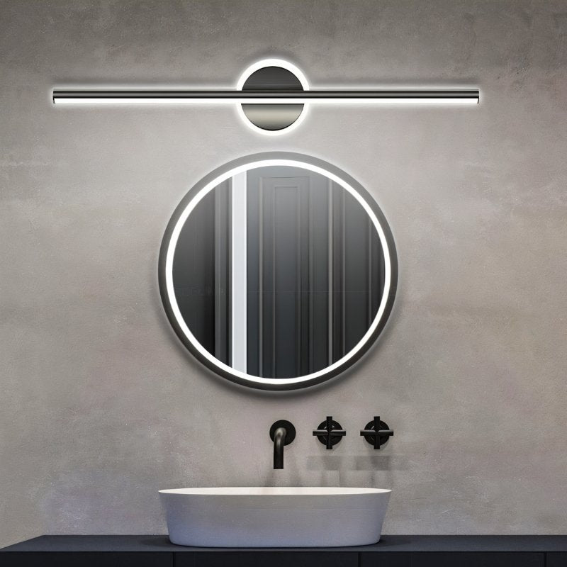 Clérachic black bar wall light over a round mirror with an LED rim, on a grey concrete wall with a white basin.