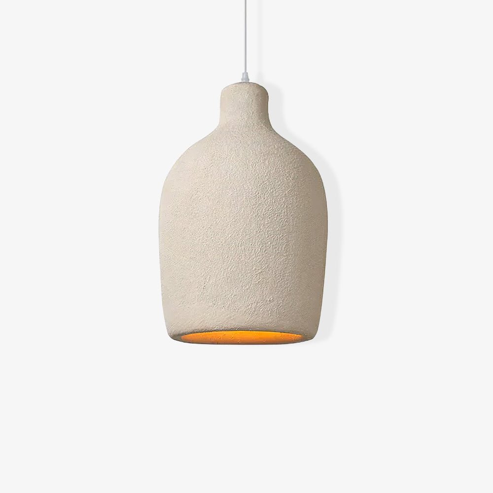 Rounded bottle-shaped Clérachic pendant light with a rough beige finish and an amber glow inside the opening, on white.