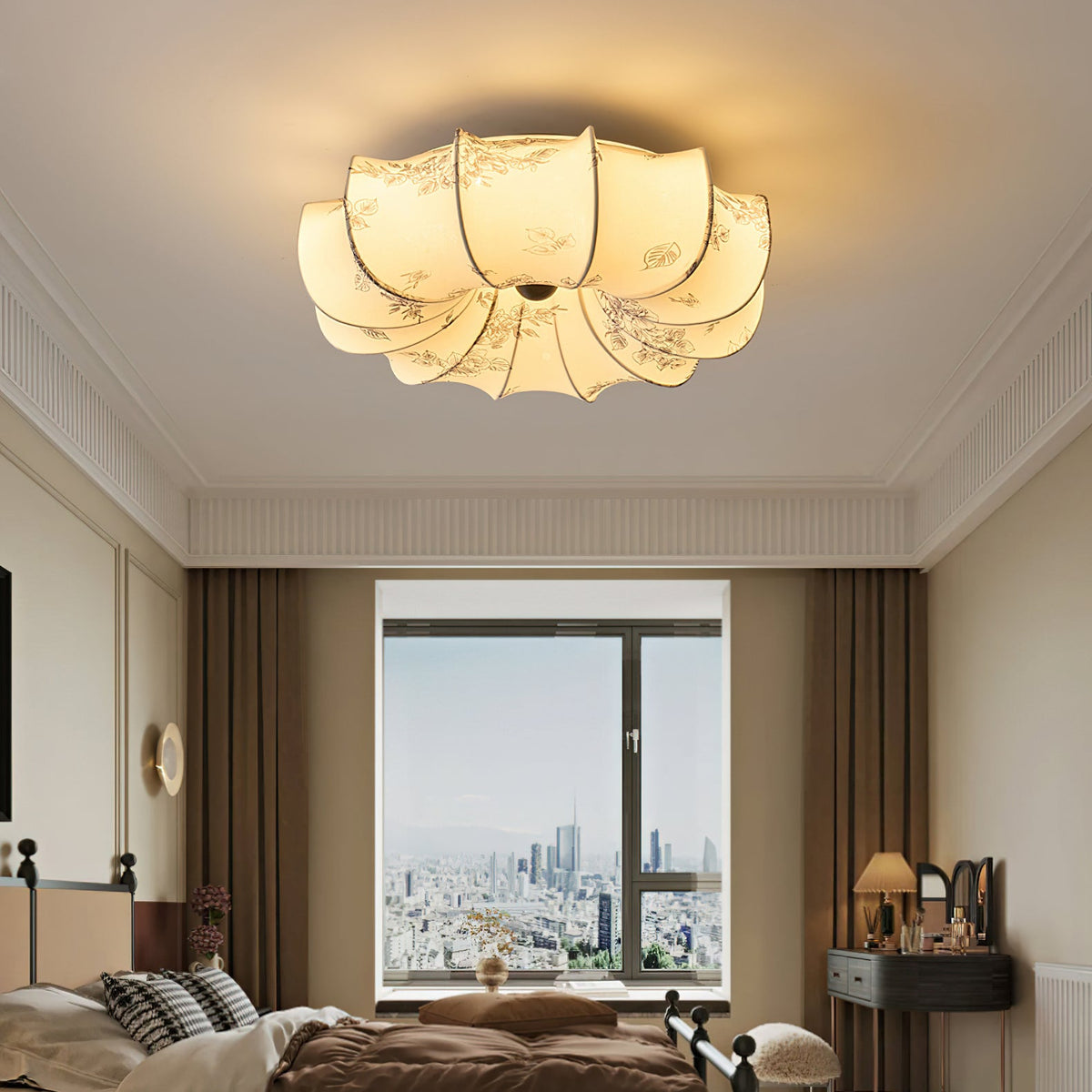 Clérachic fabric ceiling light lit above a bedroom with brown curtains and a city view through the window.