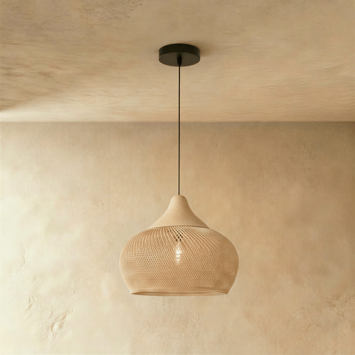 Clérachic natural rattan pendant light with a woven beige dome shade and matching wood cap over a plaster wall.