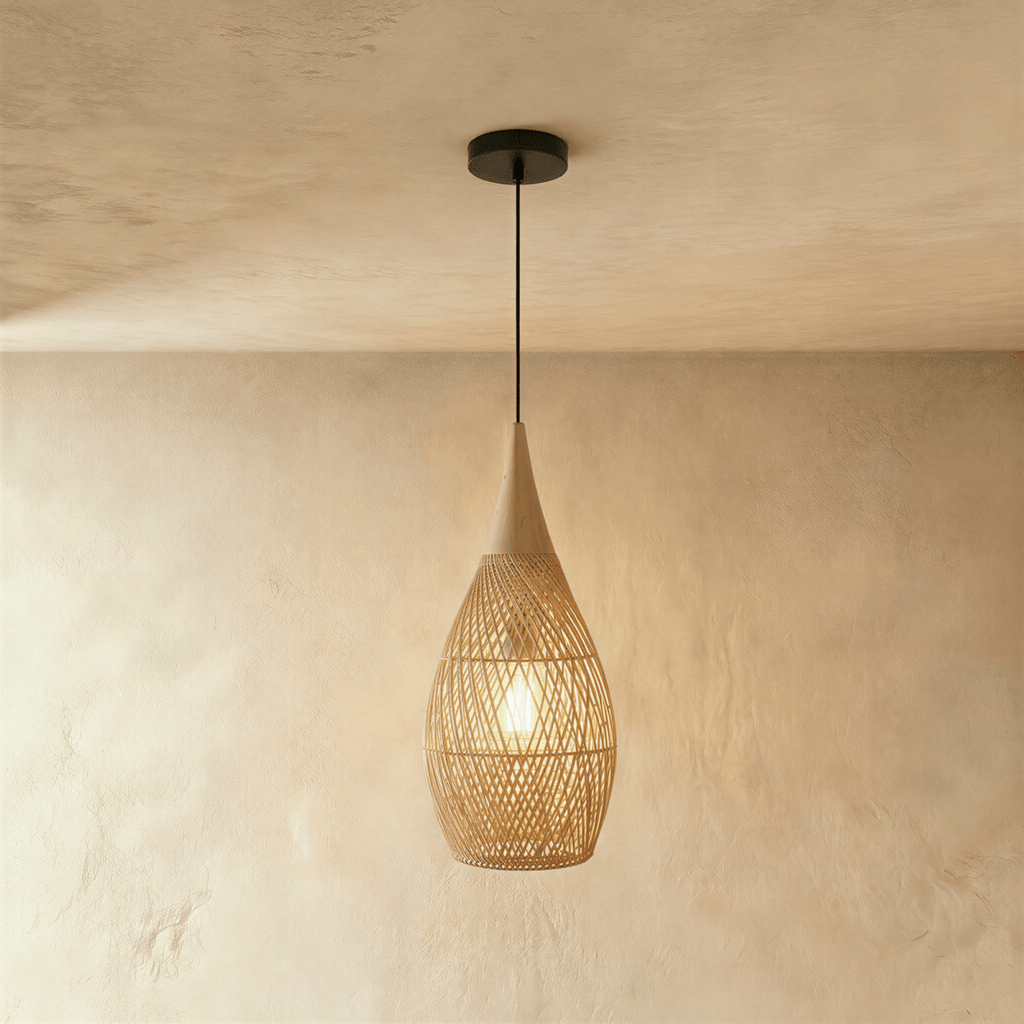 Clérachic natural rattan pendant light with a woven teardrop shade in beige and a matching wood cap.