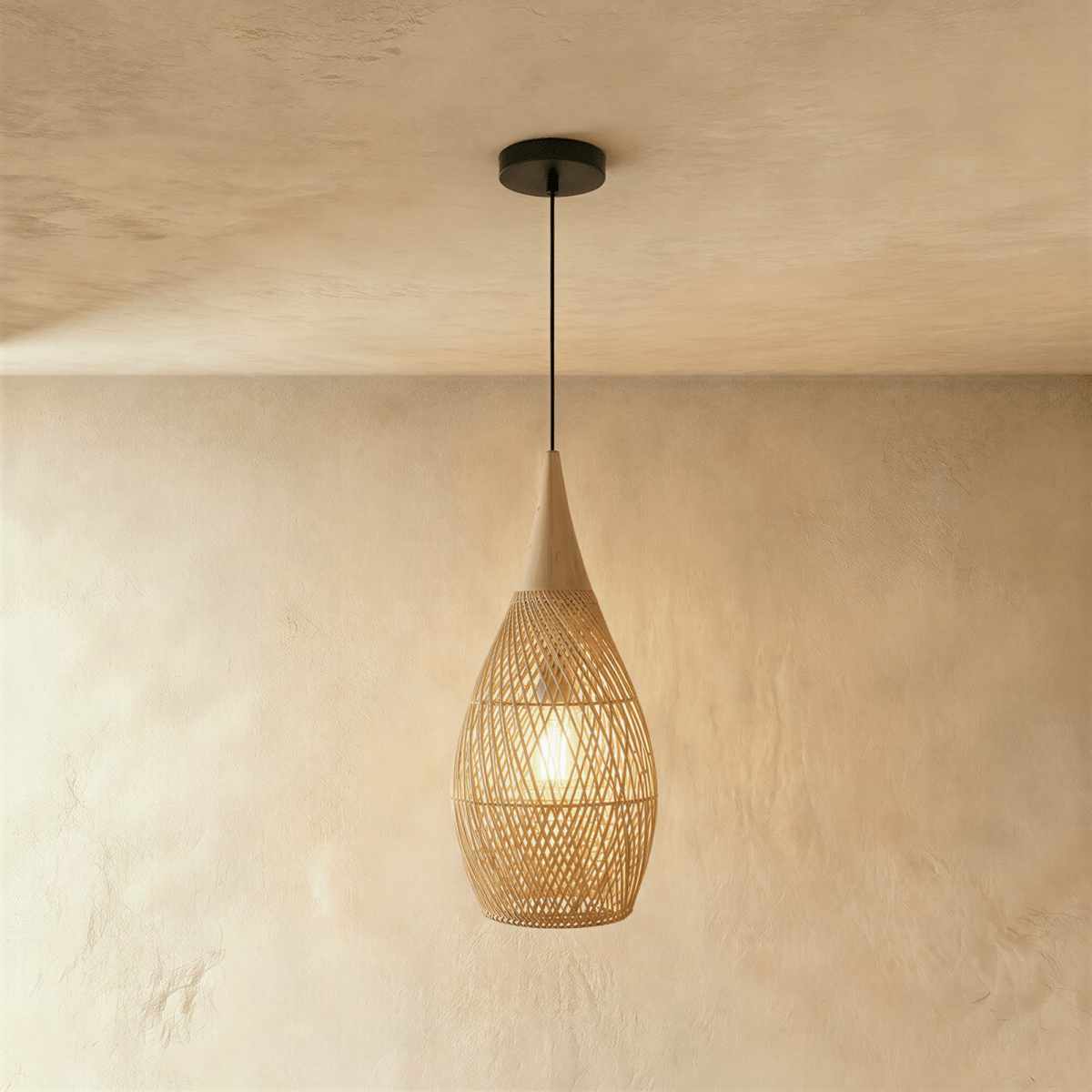 Clérachic natural rattan pendant light with a woven teardrop shade in beige and a matching wood cap.