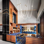 Clérachic LED rope pendants hanging in long loops from gold-toned plates above a bar with wood panelling and blue booth seating.
