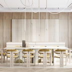 Pale Clérachic rope pendants hanging over a long white table with gold-cushioned chairs, in front of a perforated wooden wall.