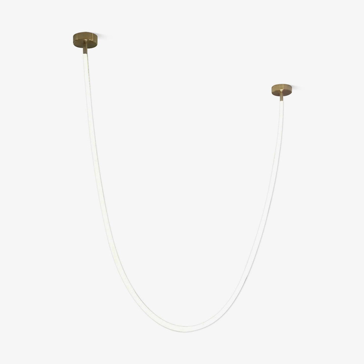 This Clérachic LED rope pendant on a pale grey backdrop, unlit, a thin tube in a wide U between two gold-toned plates.