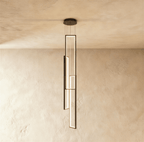 Clérachic black stairwell chandelier with four slim LED frames hung from a round ceiling canopy, glowing against a plaster wall.
