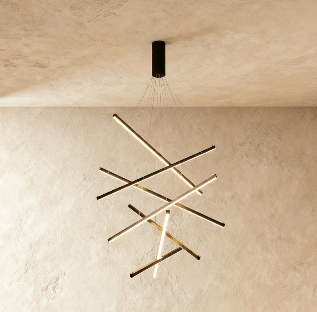 A denser view of the Clérachic black staggered-bar chandelier, its aluminium arms glowing warm white in an asymmetric cluster.