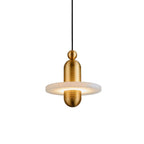 Clérachic gold-hardware pendant with one glowing alabaster disc through the ribbed capsule, straight-on on white.