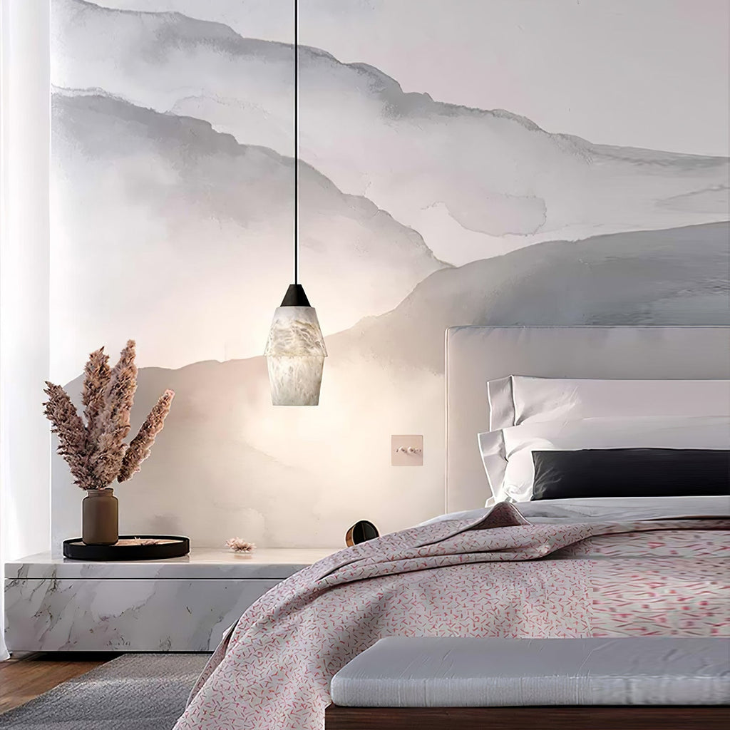 Clérachic Black and White Alabaster Pendant Light glows in a mountain-mural bedroom beside a marble plinth and white pillows.