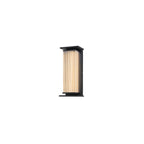 A short Clérachic wall light with a ribbed cream shade and black frame, unlit on a plain white backdrop.
