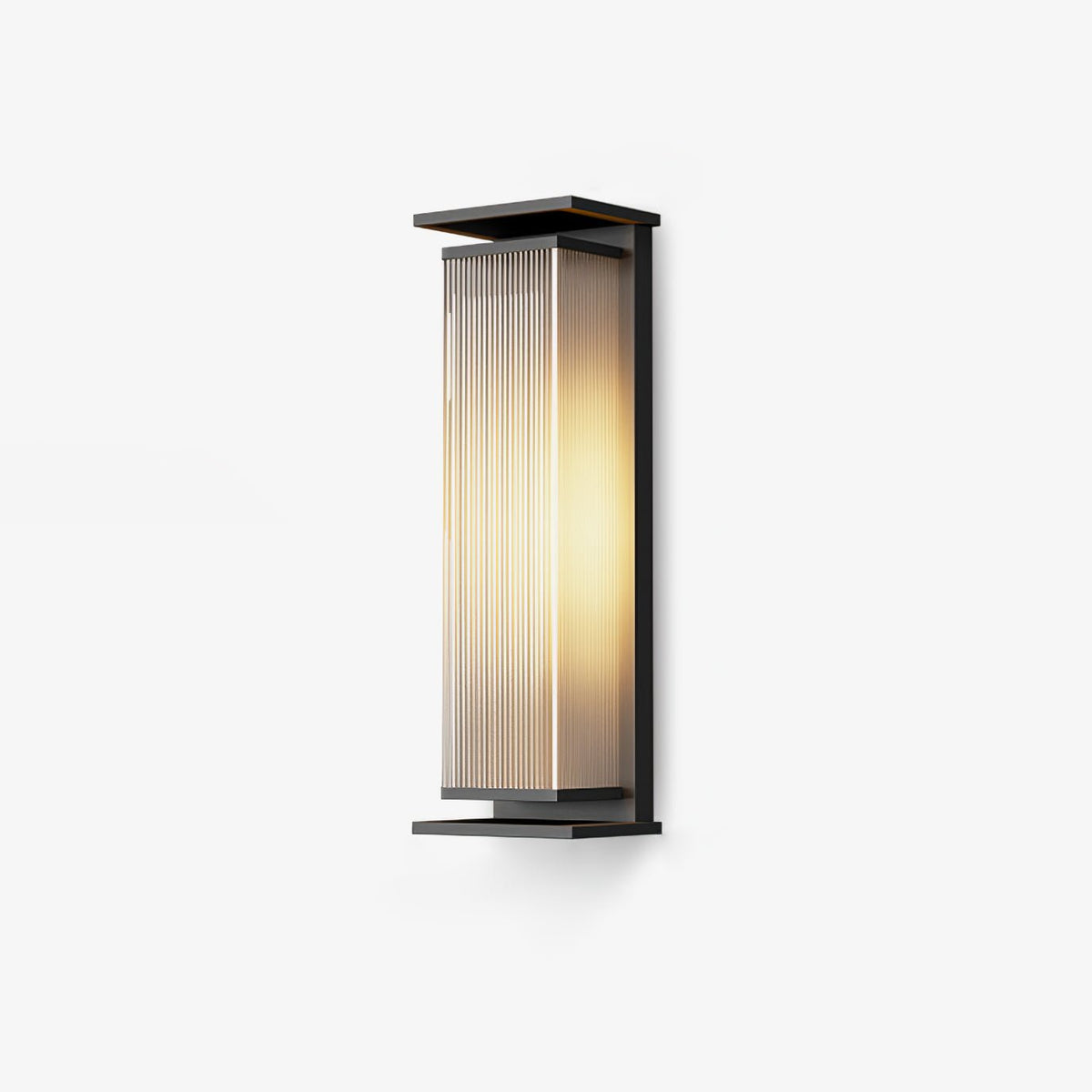 A mid-height Clérachic wall light with a black frame and glowing ribbed shade, on a pale backdrop.